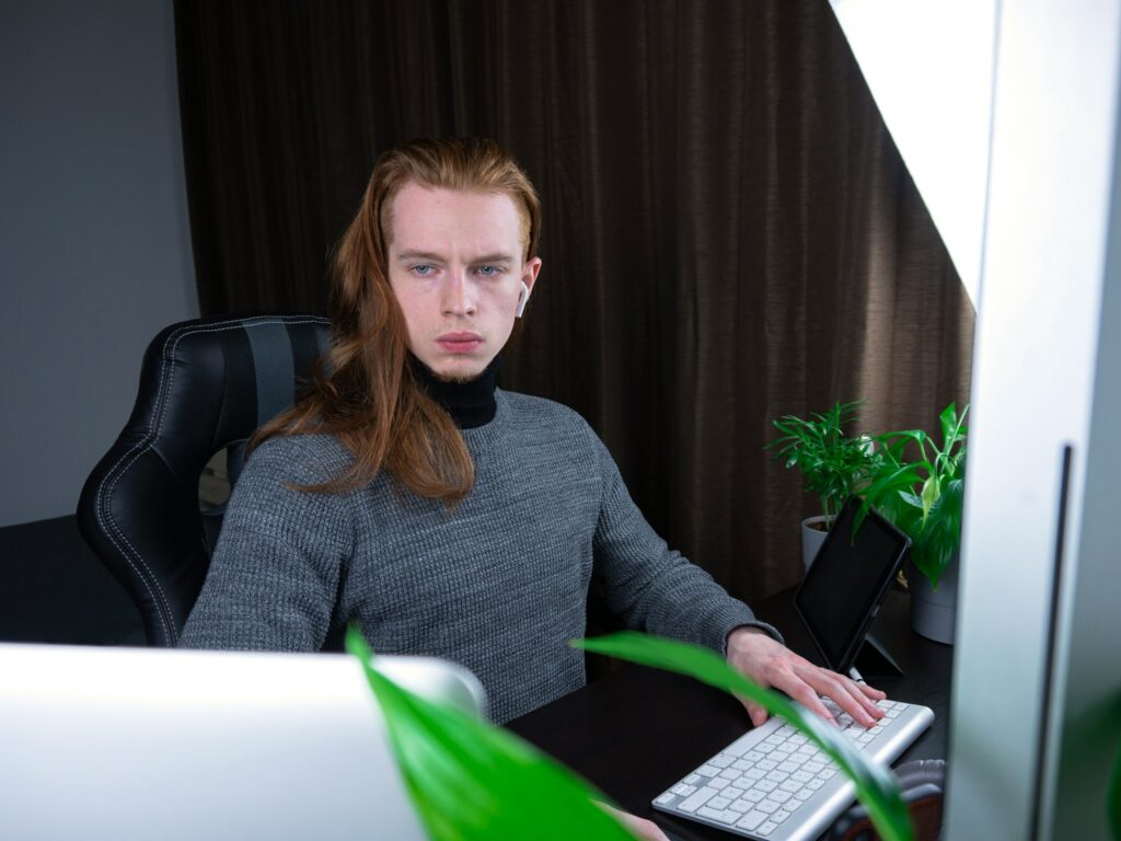man in gray long-sleeve top