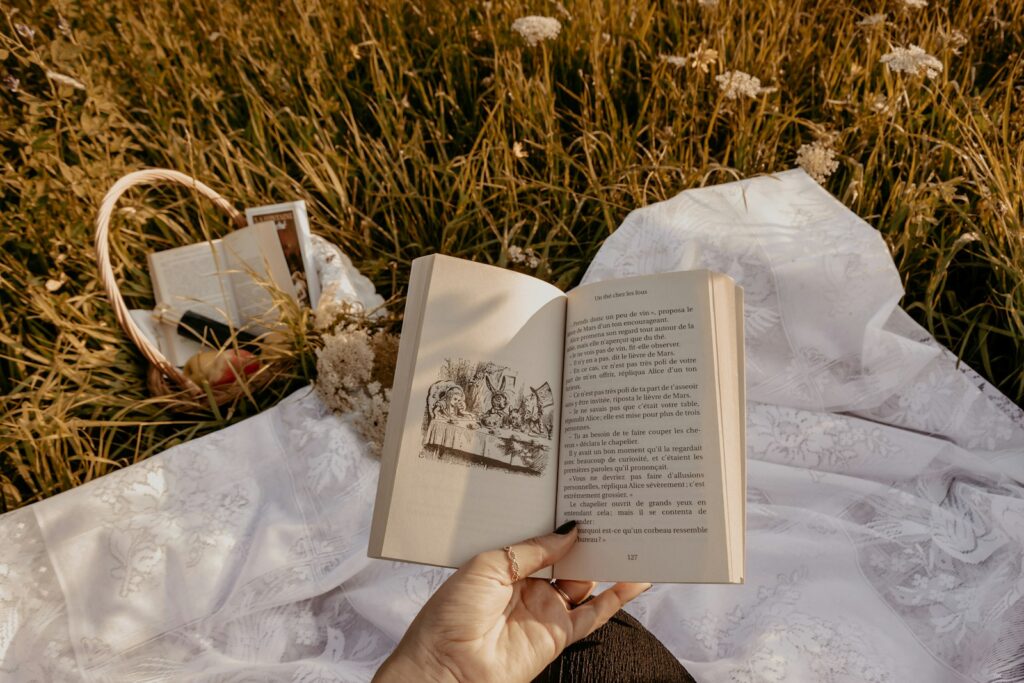 person holding white book page